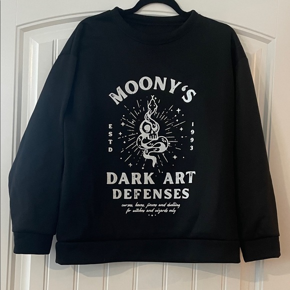 Sweaters - Harry Potter // Moony's Dark Art Defenses Black Graphic Sweatshirt